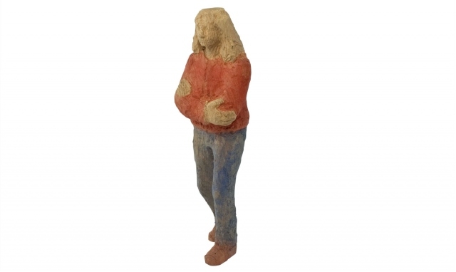Wood sculpture woman with red jacket